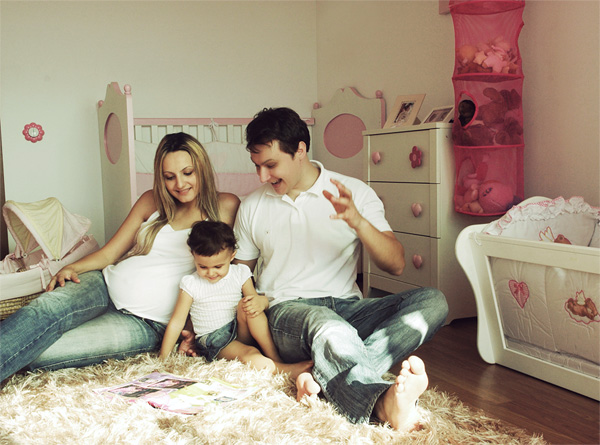family in child's bedroom
